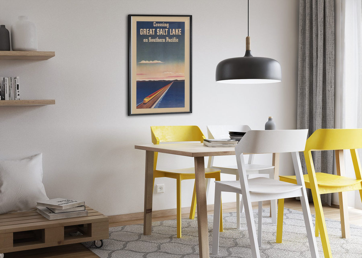Crossing Great Salt Lake Southern Pacific poster framed above a dining table