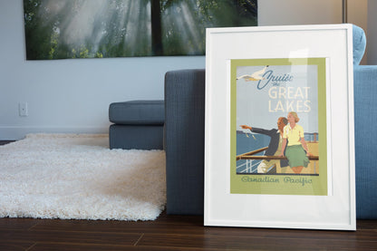 Cruise the Great Lakes Canadian Pacific poster leaning beside a blue sofa
