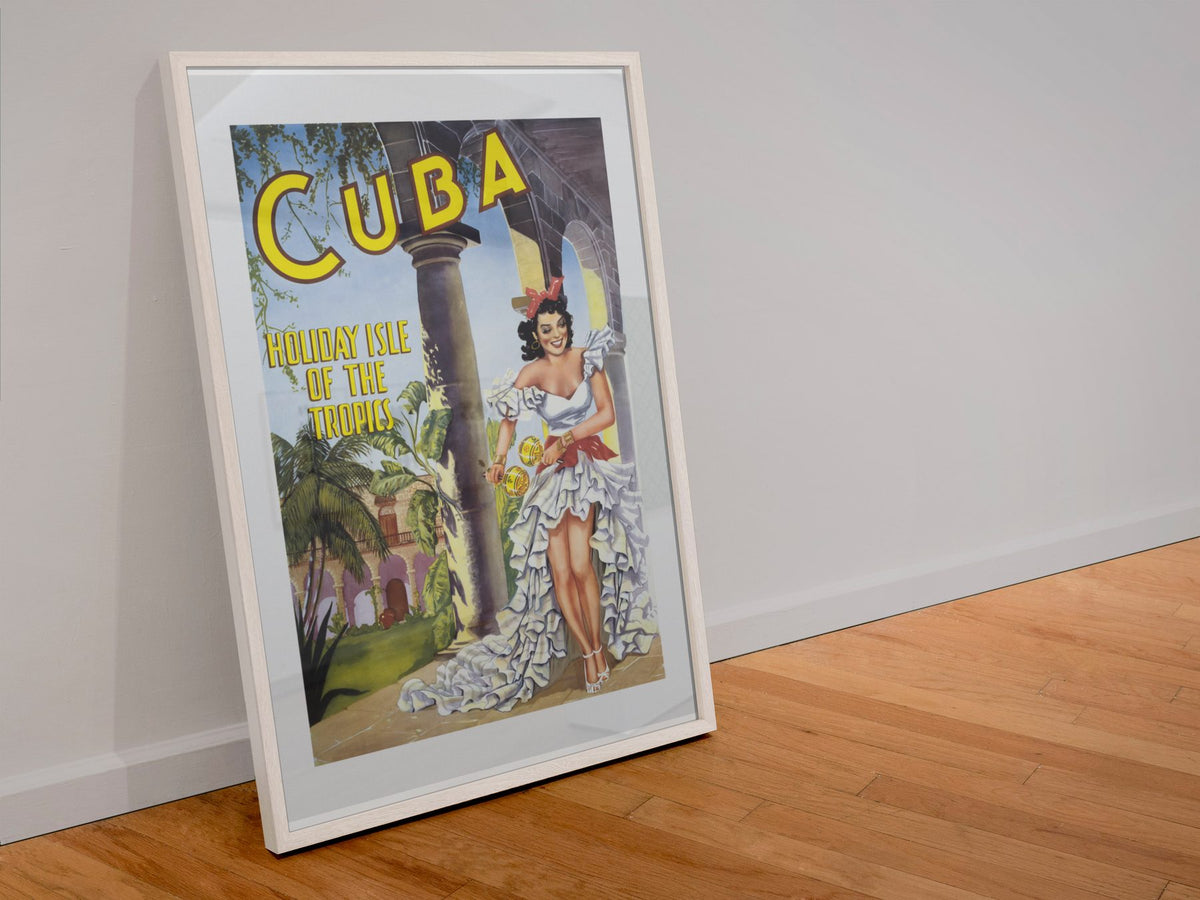 Cuba Holiday Isle of the Tropics poster in a white frame leaning against a wall