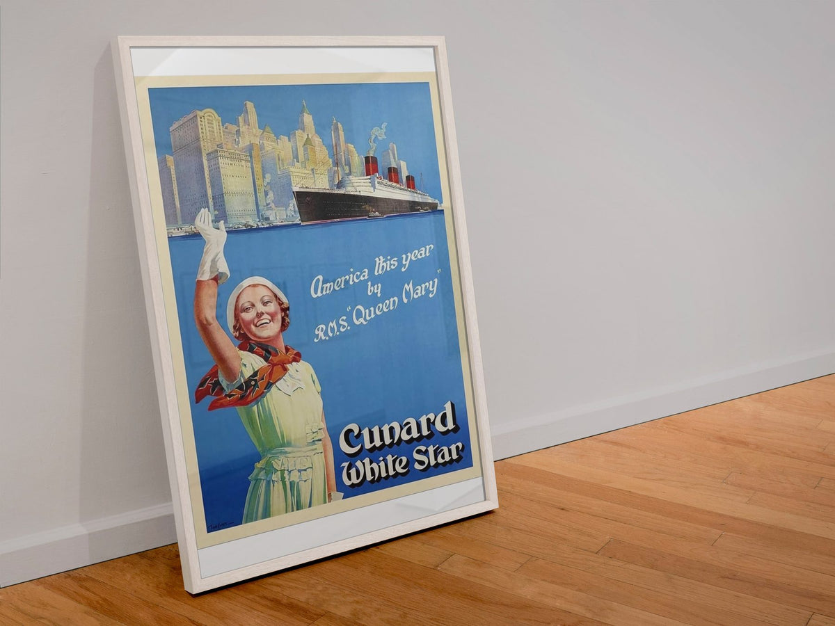Cunard White Star America by Queen Mary poster in a white frame leaning against a wall