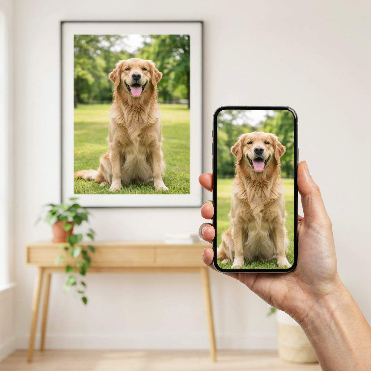 Example: a golden retriever photo on a phone, printed as a vertical framed print hanging on the wall behind it