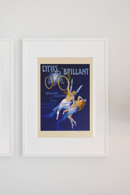 Cycles Brillant 1900 bicycle poster in a white frame on a light wall