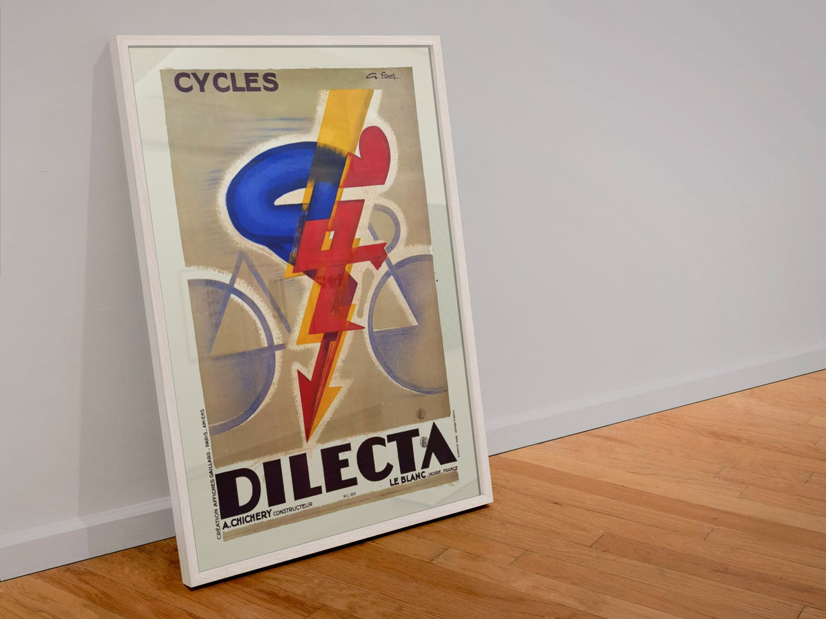Cycles Dilecta poster in a white frame leaning against a wall