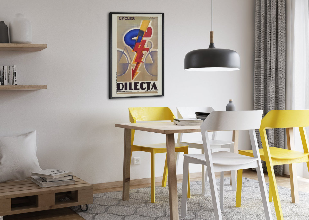 Cycles Dilecta poster framed above a dining table