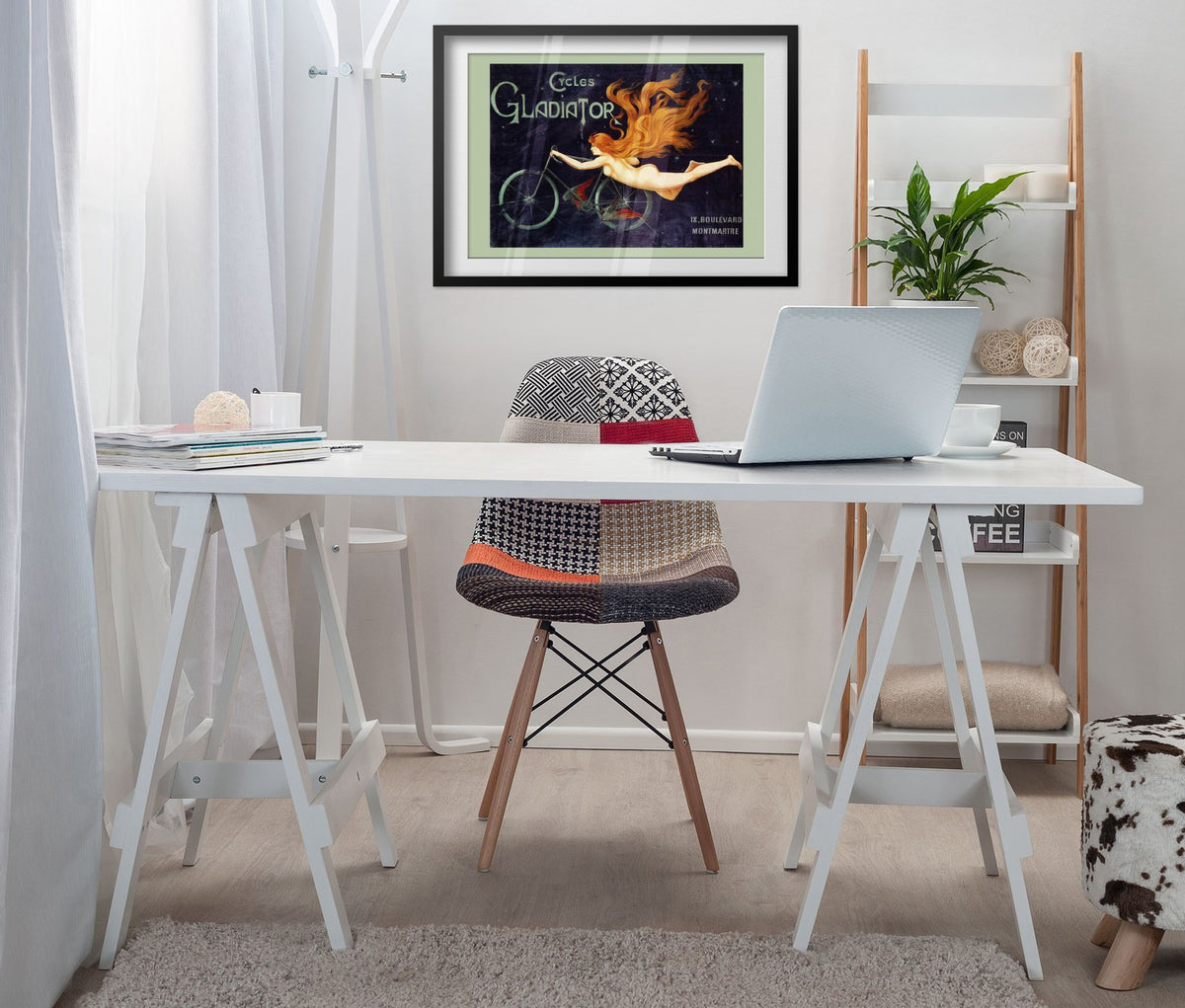 Cycles Gladiator poster framed above a white desk in a home office