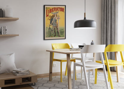 Cycles Liberator 1899 bicycle poster framed above a dining table