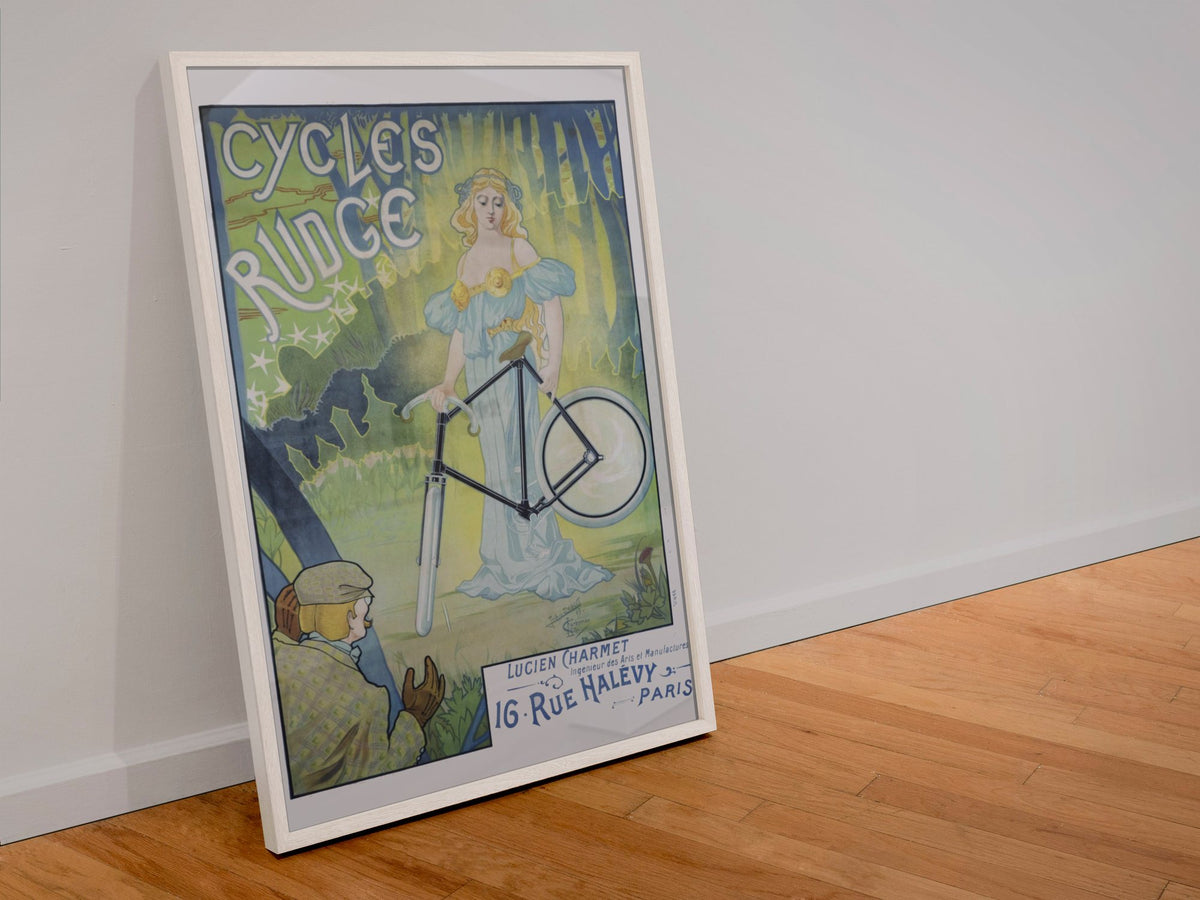 Cycles Rudge Paris poster in a white frame leaning against a wall