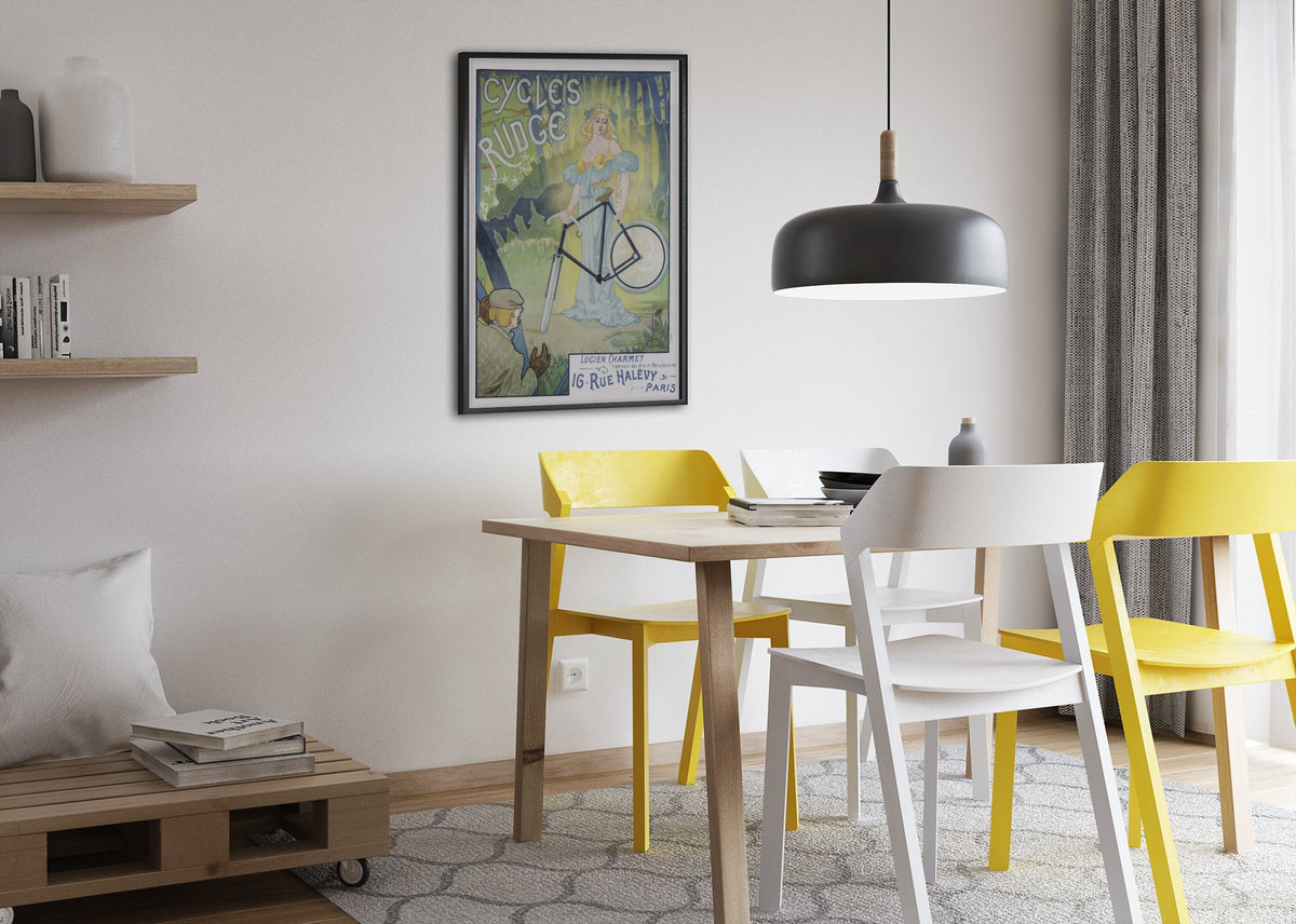 Cycles Rudge Paris poster framed above a dining table