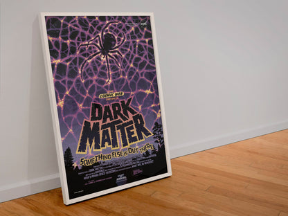 Dark Matter, NASA Galaxy of Horrors poster in a white frame leaning against a wall