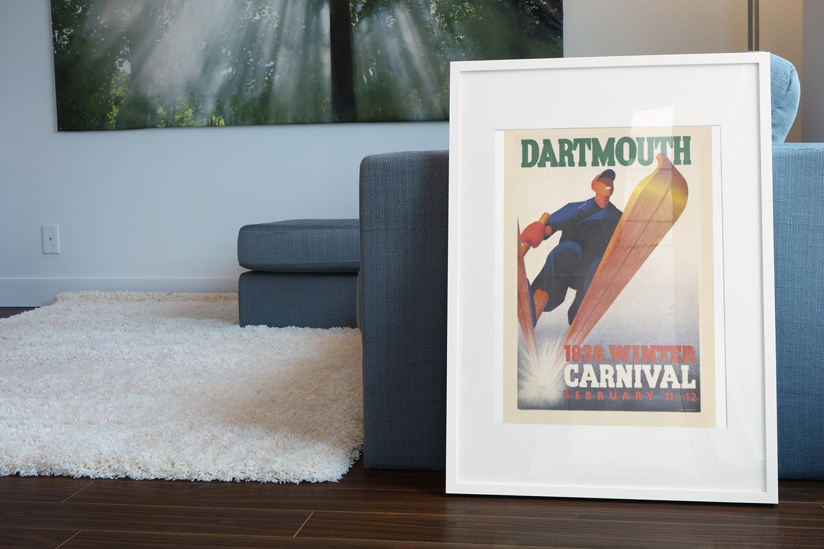 Dartmouth Winter Carnival 1938 poster leaning beside a blue sofa