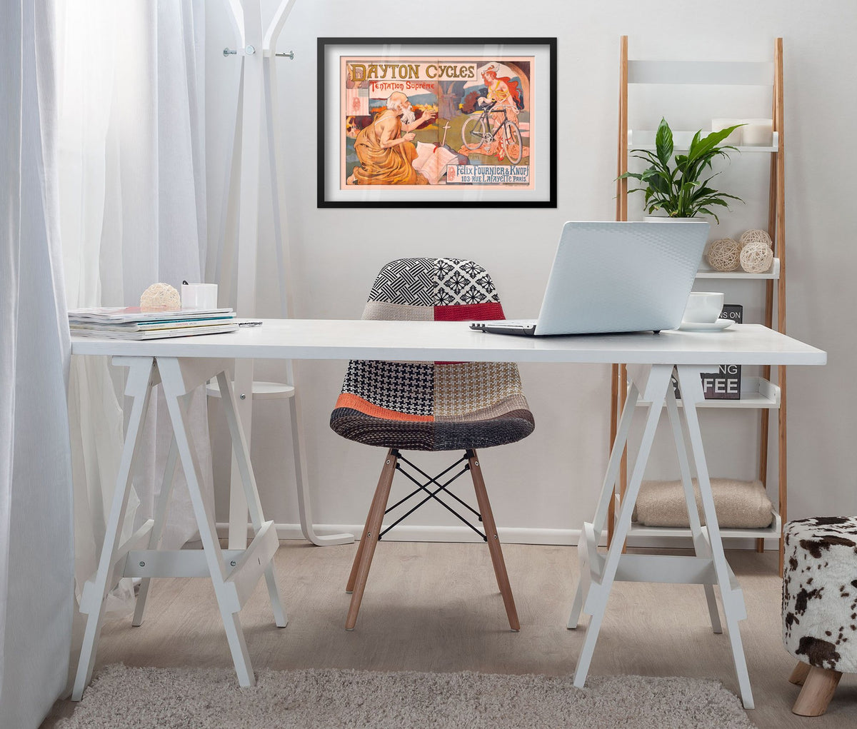 Dayton Cycles Tentation Supreme poster framed above a white desk in a home office