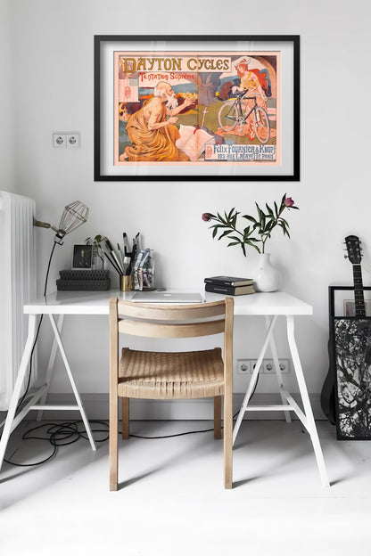 Dayton Cycles Tentation Supreme poster framed above a desk in a bright white room