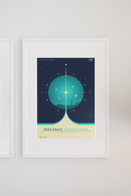 Deep Space Atomic Clock, teal poster in a white frame on a light wall