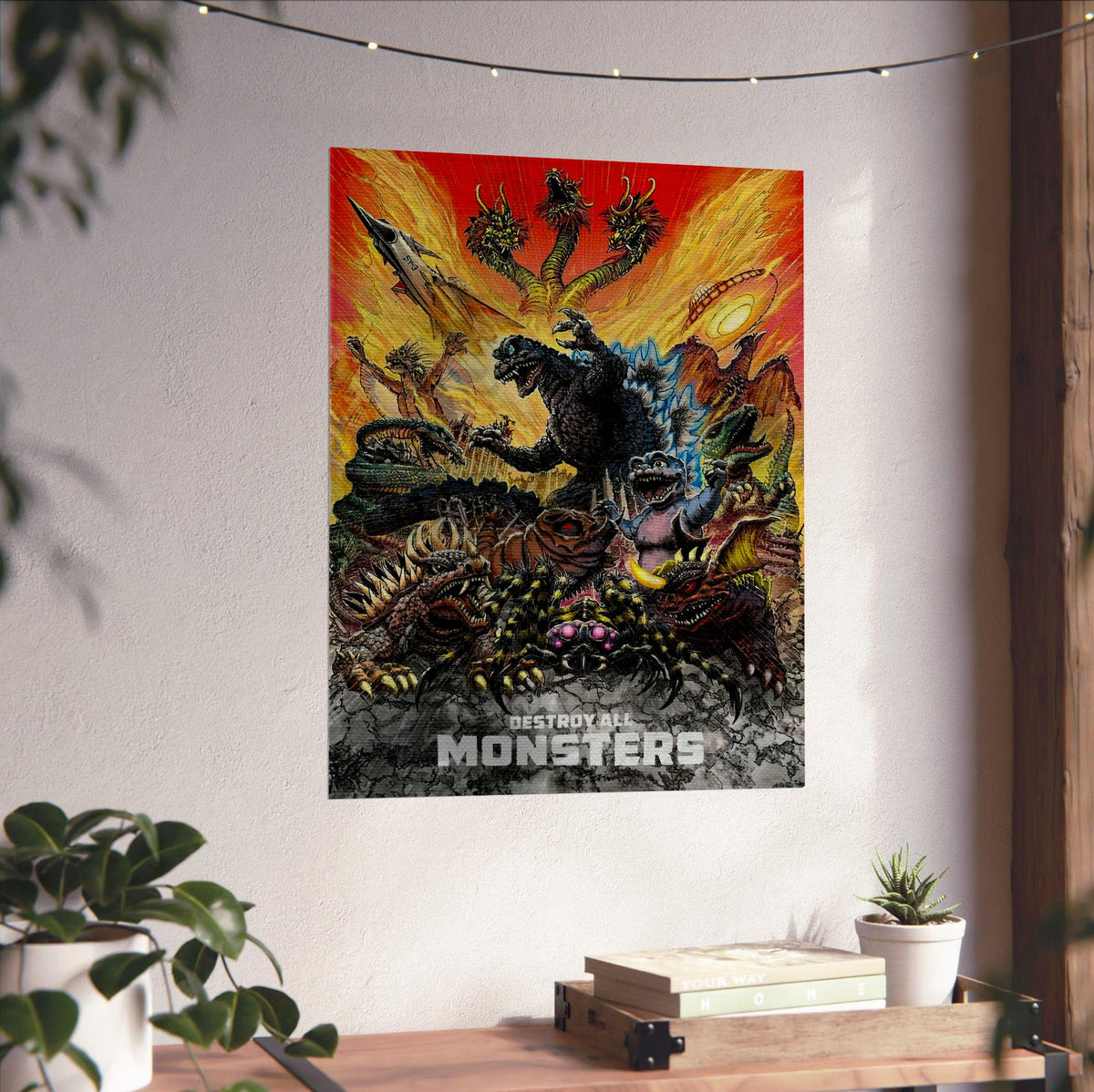 Destroy All Monsters (1968) Movie Illustrated Art poster unframed on a white wall above a desk