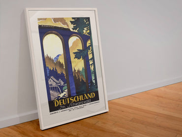 Deutschland Black Forest poster in a white frame leaning against a wall