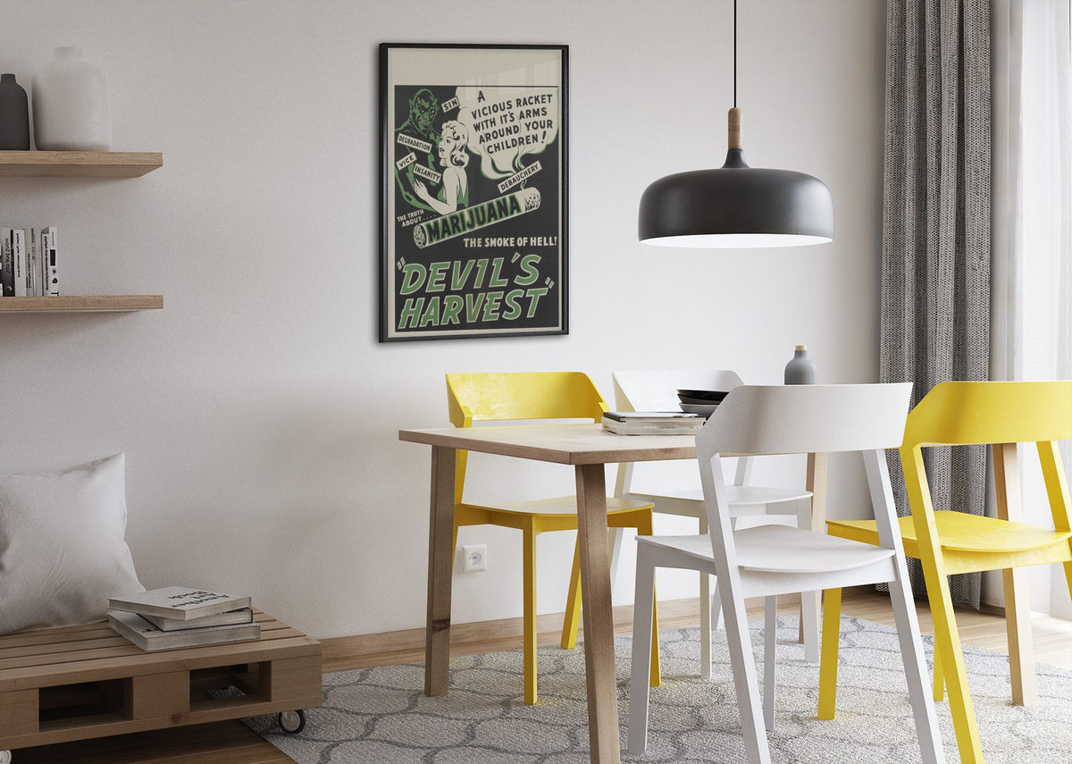Devils Harvest poster framed above a dining table