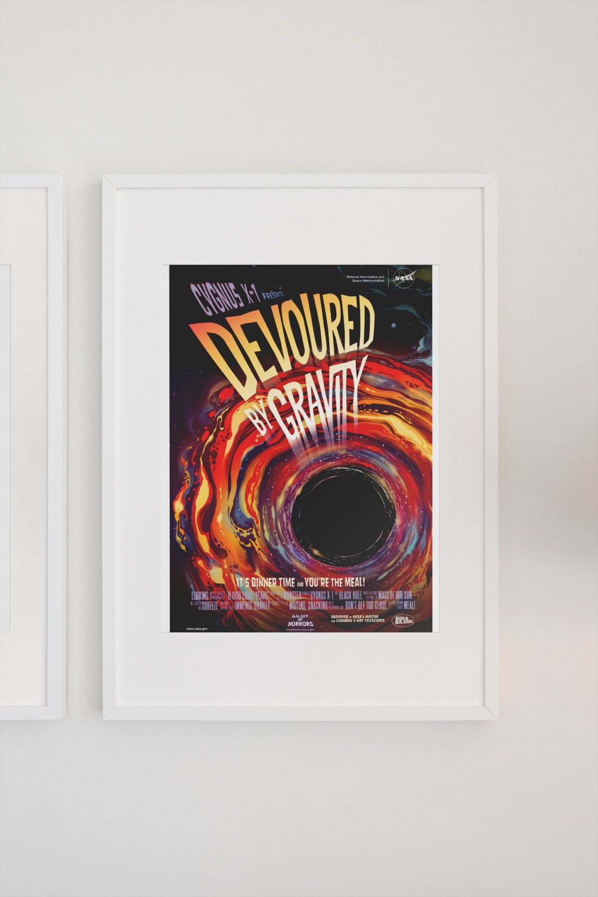 Devoured by Gravity, Cygnus X-1 poster in a white frame on a light wall