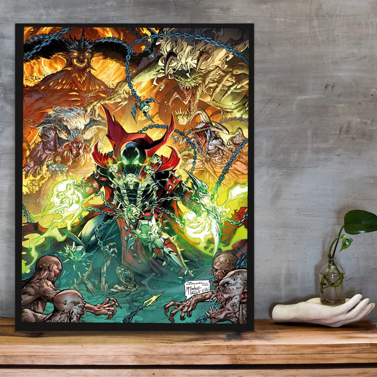 Diablo Immortal x Spawn Todd McFarlane Art poster in a black frame on a wooden shelf against concrete