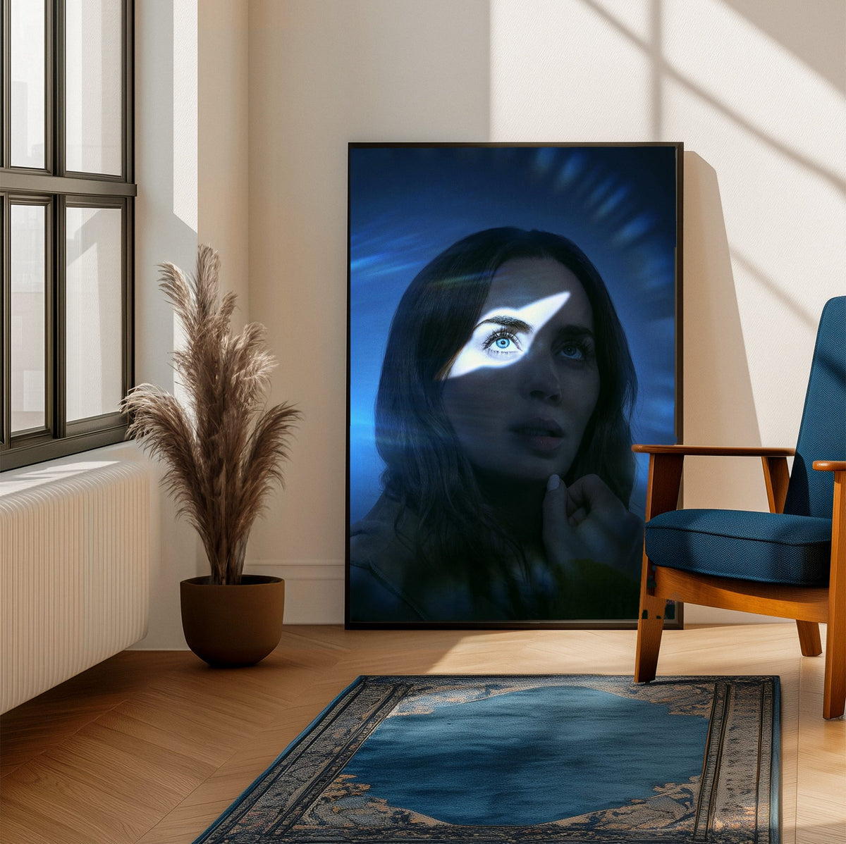 Disclosure Day (2026) Movie Key Art poster framed beside a blue armchair in a sunlit room