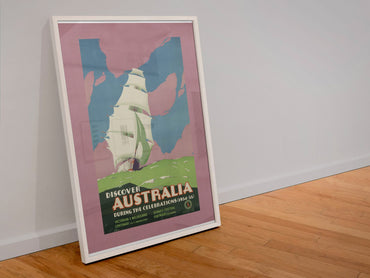Discover Australia 1934 poster in a white frame leaning against a wall