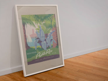 Discover Puerto Rico WPA poster in a white frame leaning against a wall