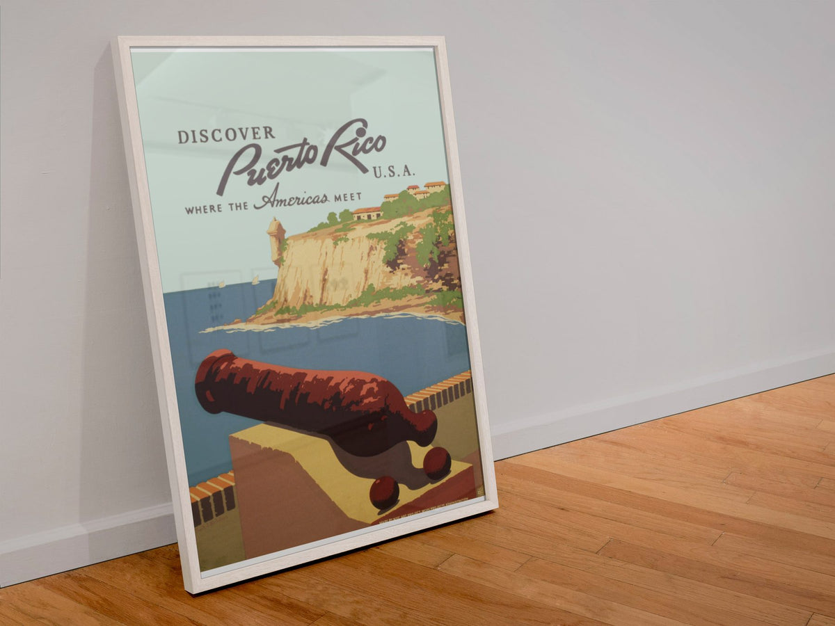 Discover Puerto Rico poster in a white frame leaning against a wall