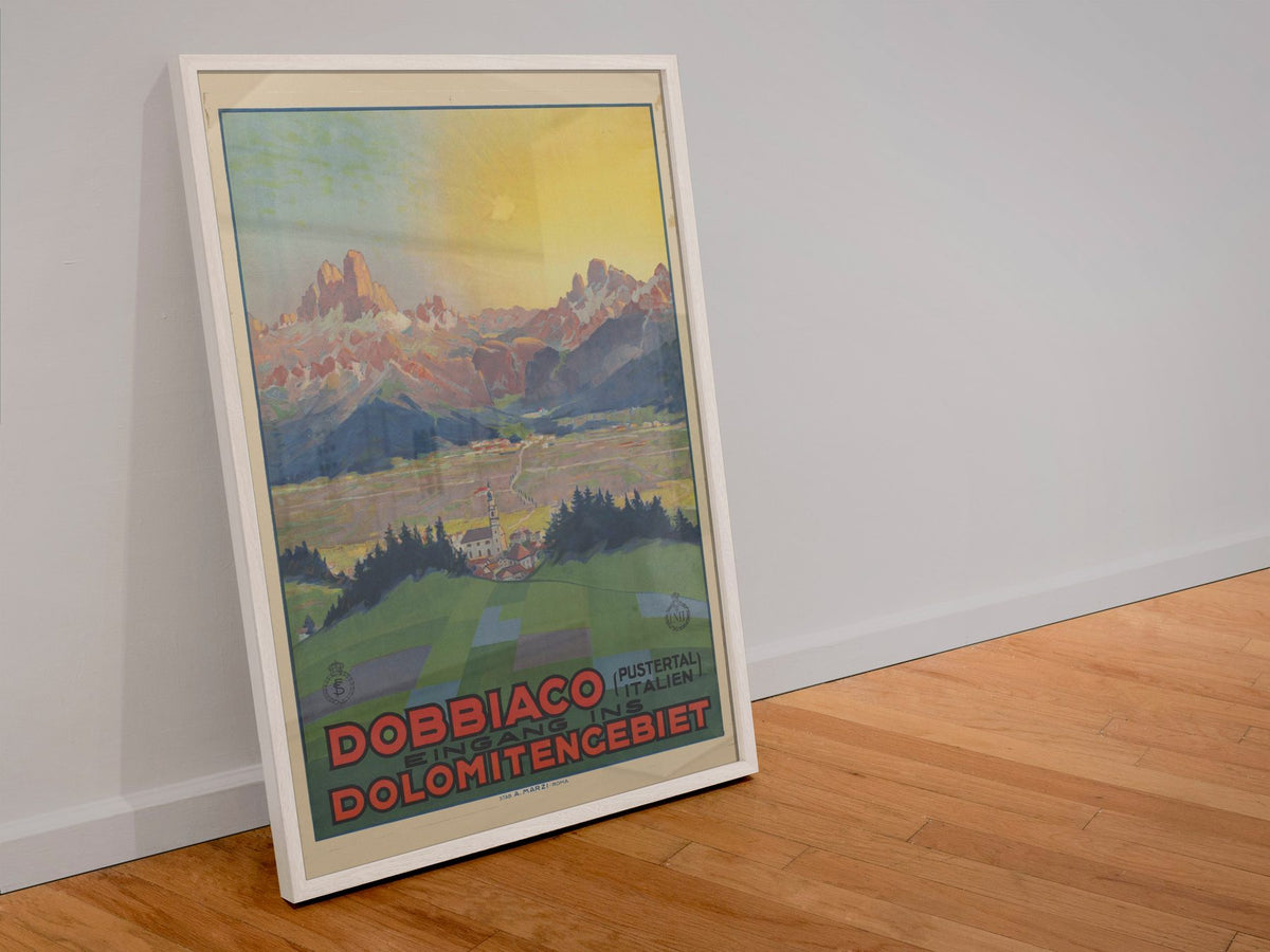 Dobbiaco — Dolomites poster in a white frame leaning against a wall