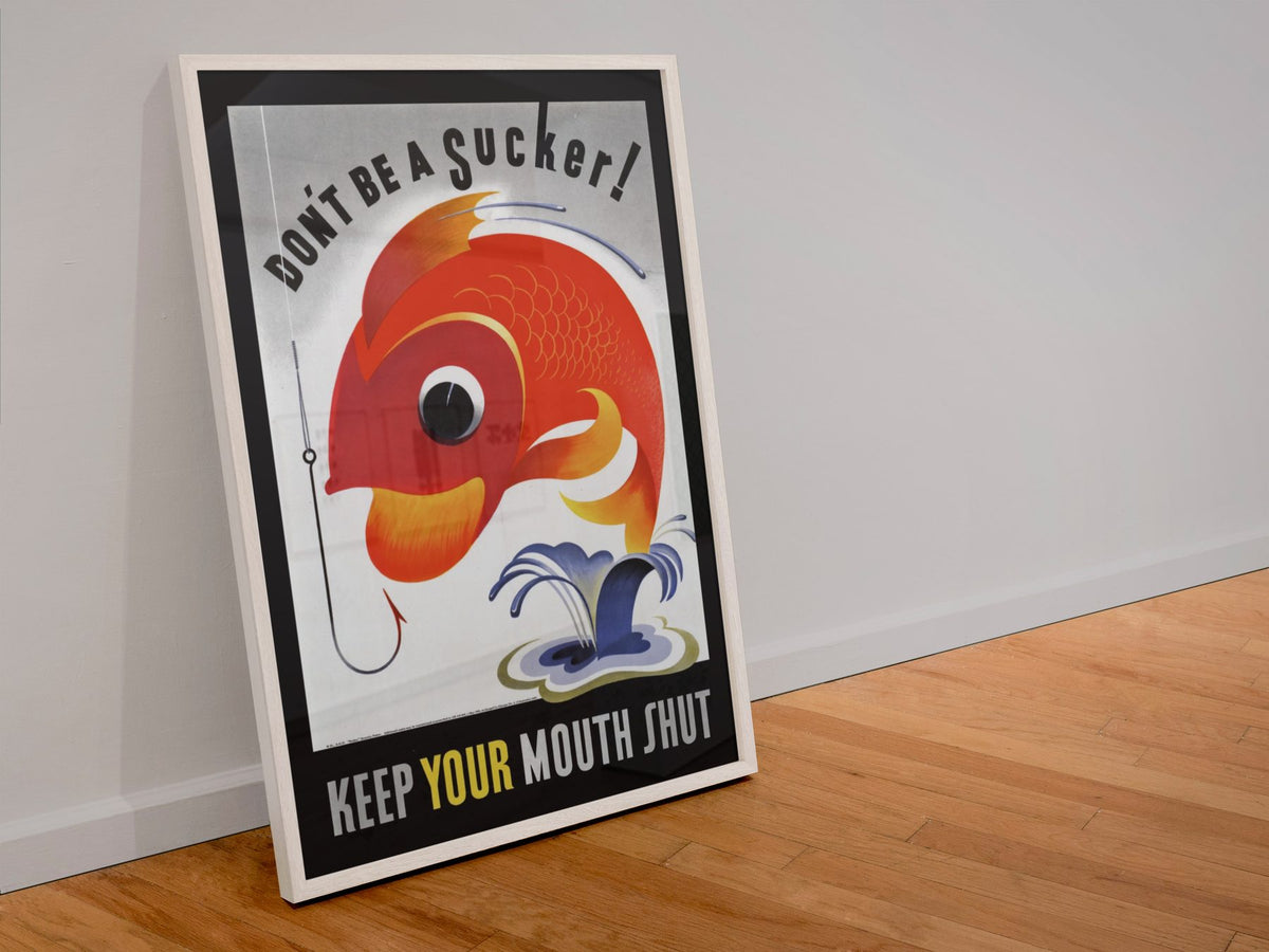Dont Be a Sucker Keep Your Mouth Shut poster in a white frame leaning against a wall