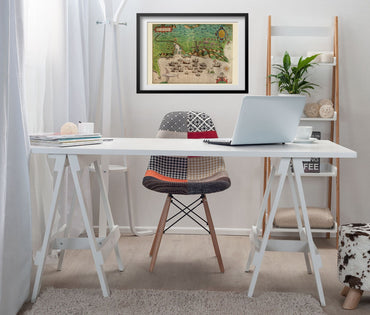 Drake Raid on Santiago 1585 framed above a white desk in a home office