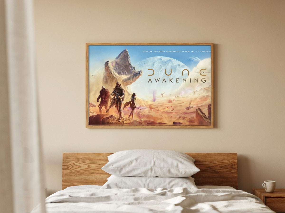 Dune: Awakening Key Art poster in a natural oak frame in a bedroom