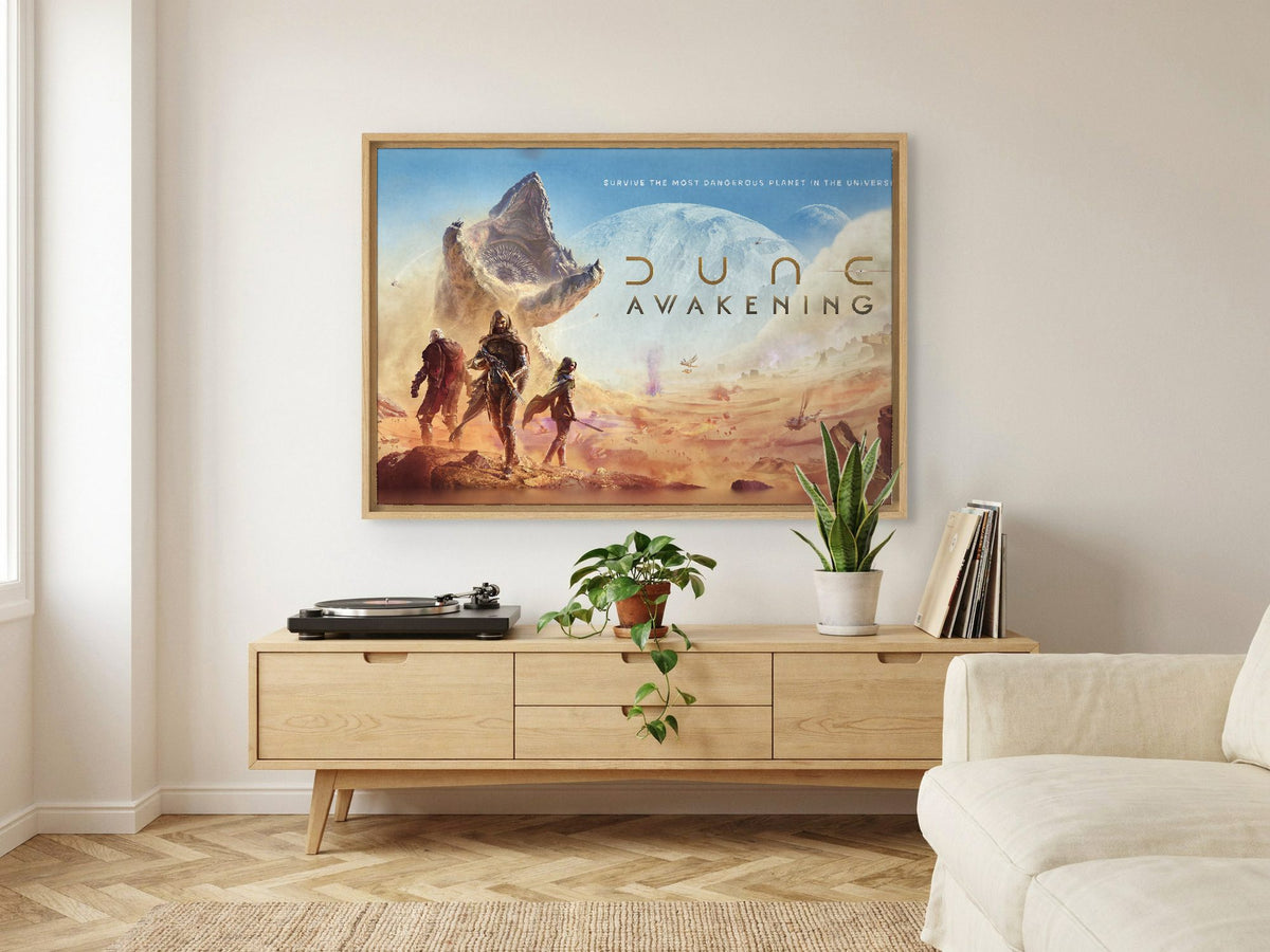 Dune: Awakening Key Art as an oak floater framed canvas in a Scandinavian lounge