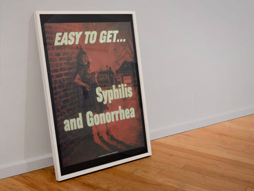 Easy to Get — Syphilis and Gonorrhea poster in a white frame leaning against a wall