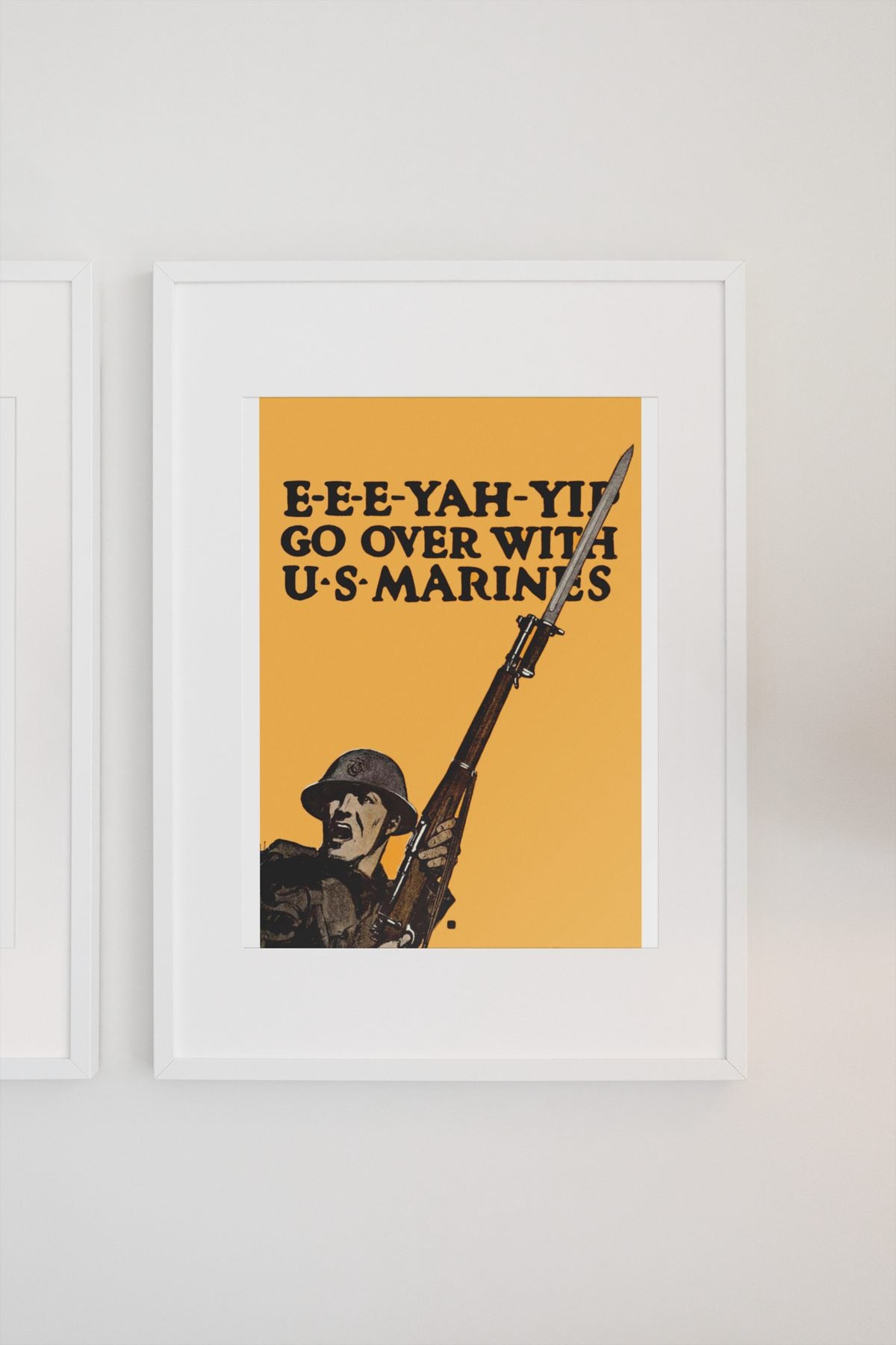 EEE Yah Yip Go Over with US Marines poster on a light wall