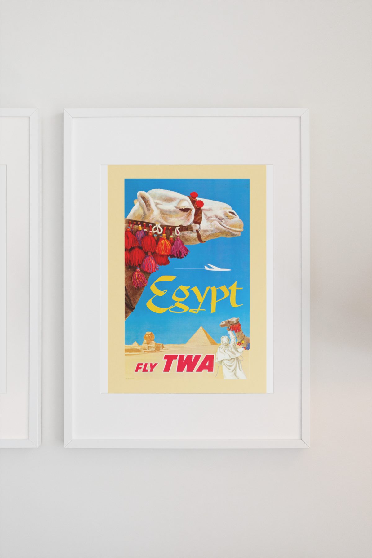 Egypt Fly TWA Camel poster on a light wall