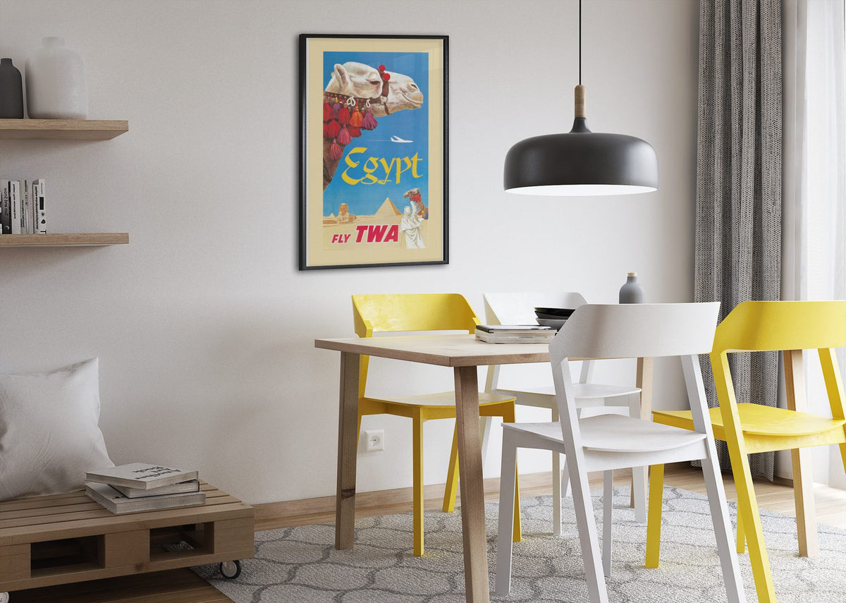 Egypt Fly TWA Camel poster framed above a dining table
