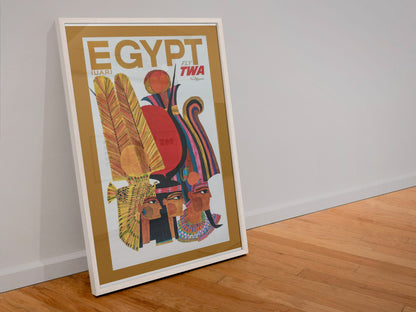 Egypt Fly TWA poster in a white frame leaning against a wall