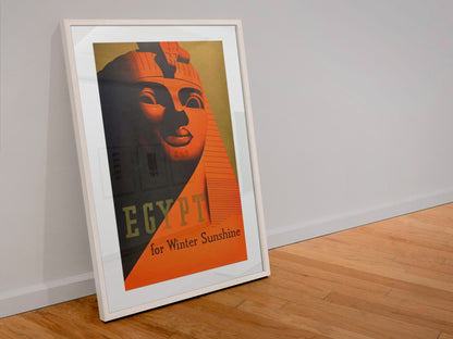 Egypt for Winter Sunshine poster in a white frame leaning against a wall