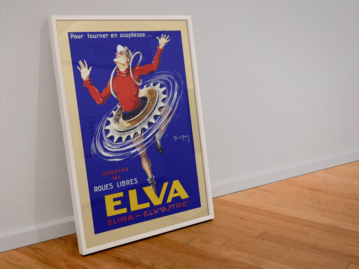 Elva Roues Libres poster in a white frame leaning against a wall