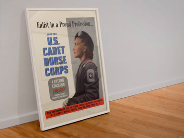 Enlist in a Proud Profession Cadet Nurse Corps poster in a white frame leaning against a wall