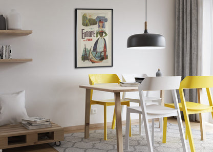Europe Fly TWA poster framed above a dining table