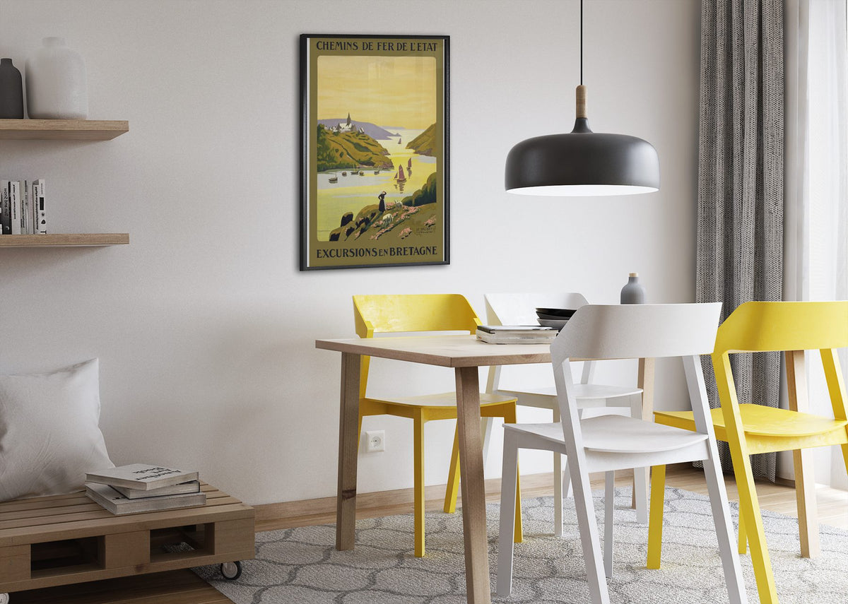 Excursions en Bretagne poster framed above a dining table