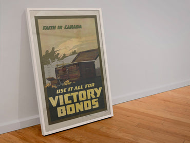Faith in Canada Victory Bonds poster in a white frame leaning against a wall