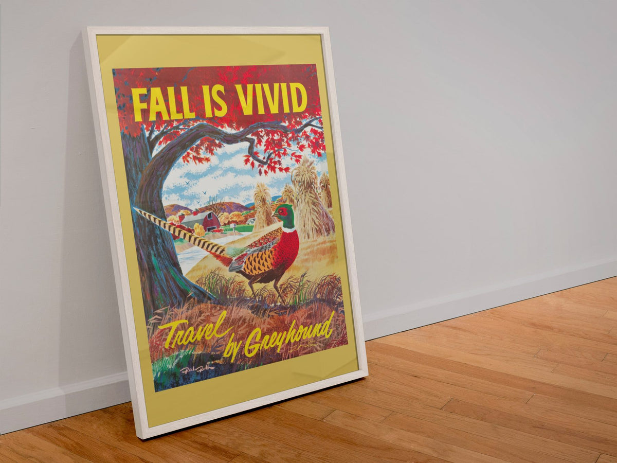 Fall is Vivid Greyhound poster in a white frame leaning against a wall