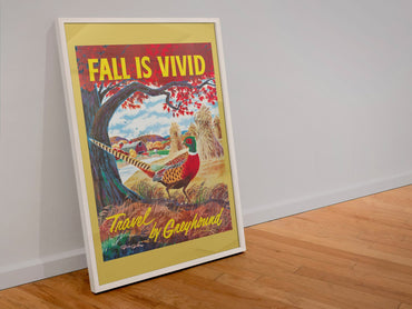 Fall is Vivid Greyhound poster in a white frame leaning against a wall