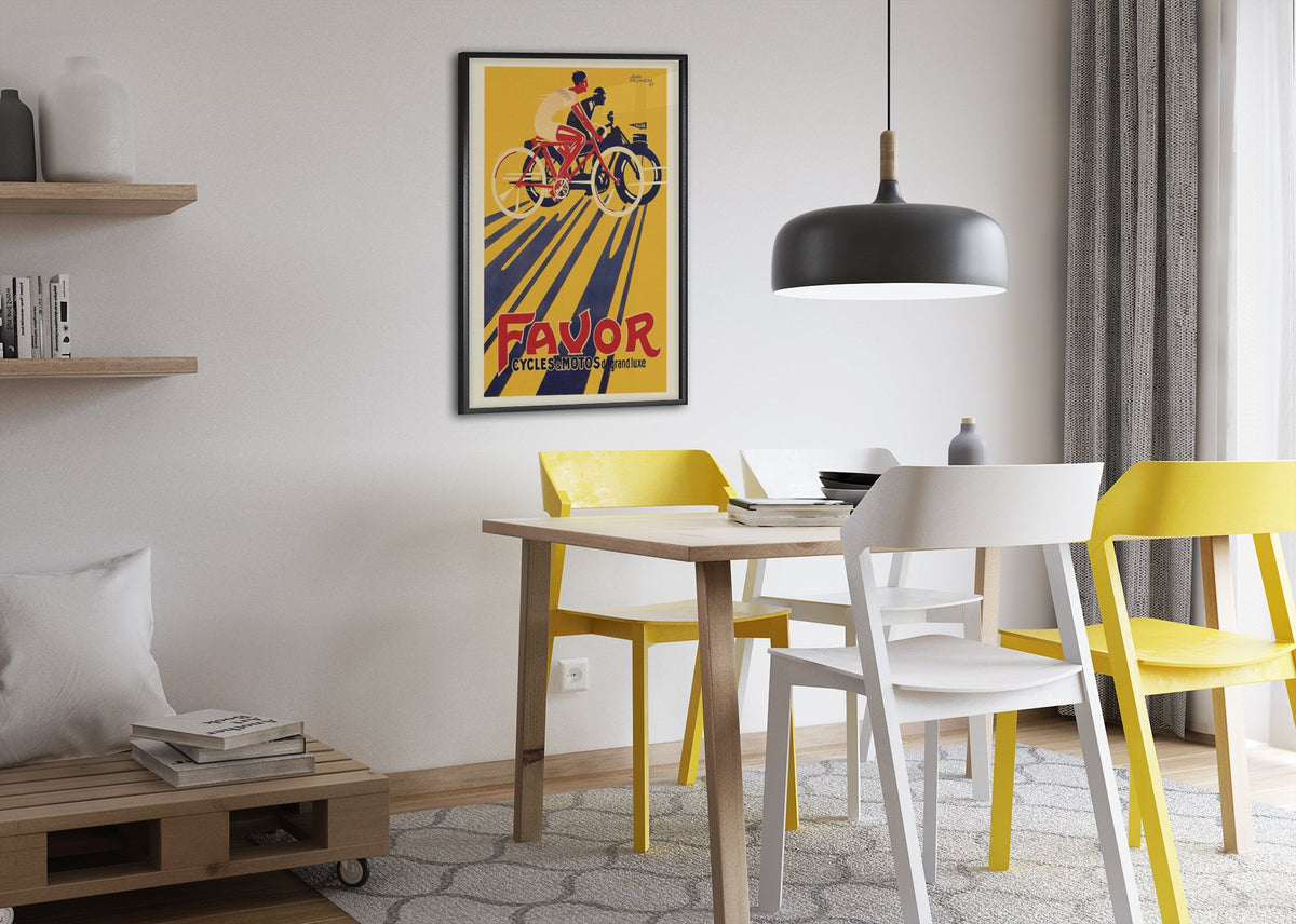 Favor Cycles & Motos poster framed above a dining table
