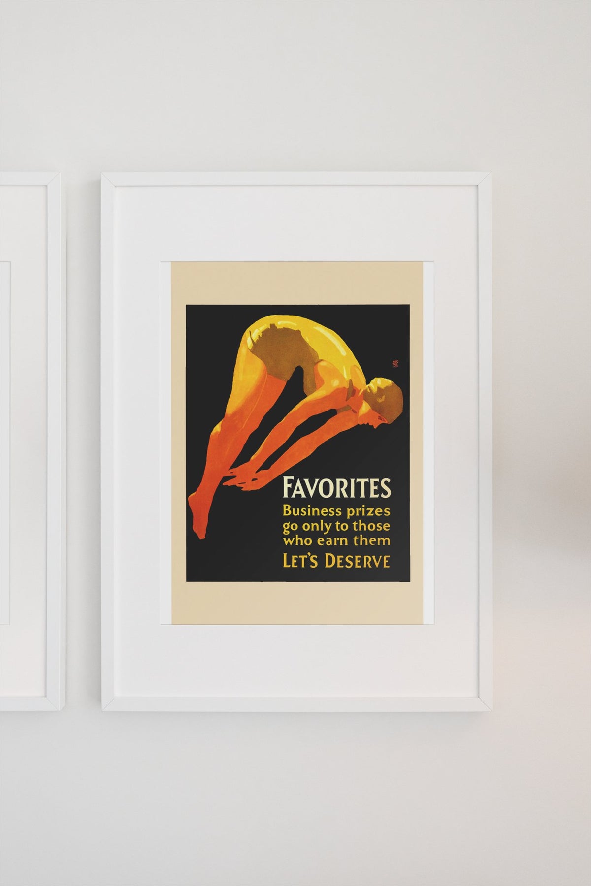 Favorites poster in a white frame on a light wall