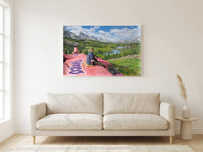 Final Fantasy VII Rebirth Cid Key Art poster in a white frame in a living room