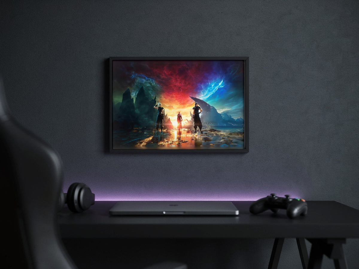 Final Fantasy VII Rebirth Key Art poster in a black frame above a gaming desk
