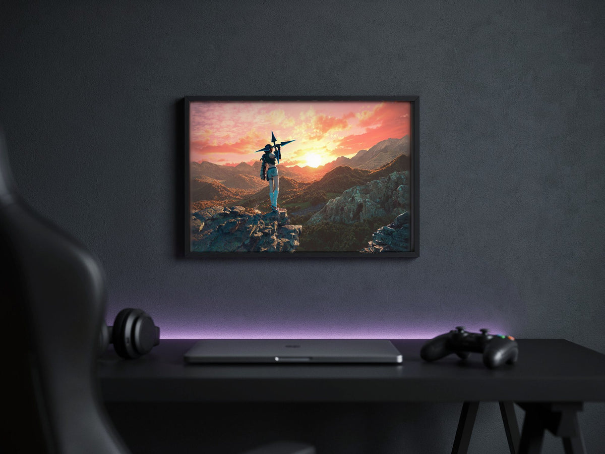 Final Fantasy VII Rebirth Yuffie Key Art poster in a black frame above a gaming desk