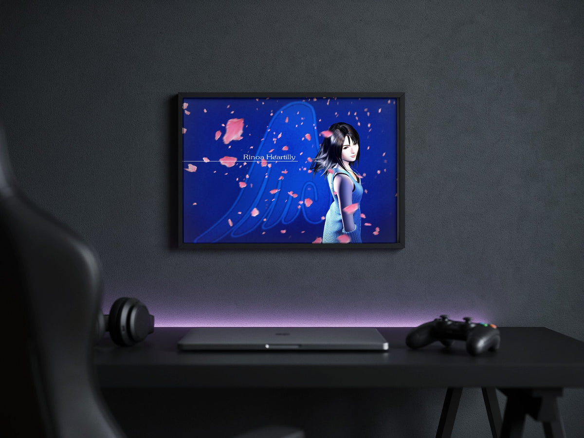Final Fantasy VIII Rinoa Heartilly Promo Art poster in a black frame above a gaming desk
